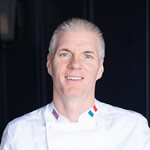 Brandon-headshot-chef-coat-1-square.jpg